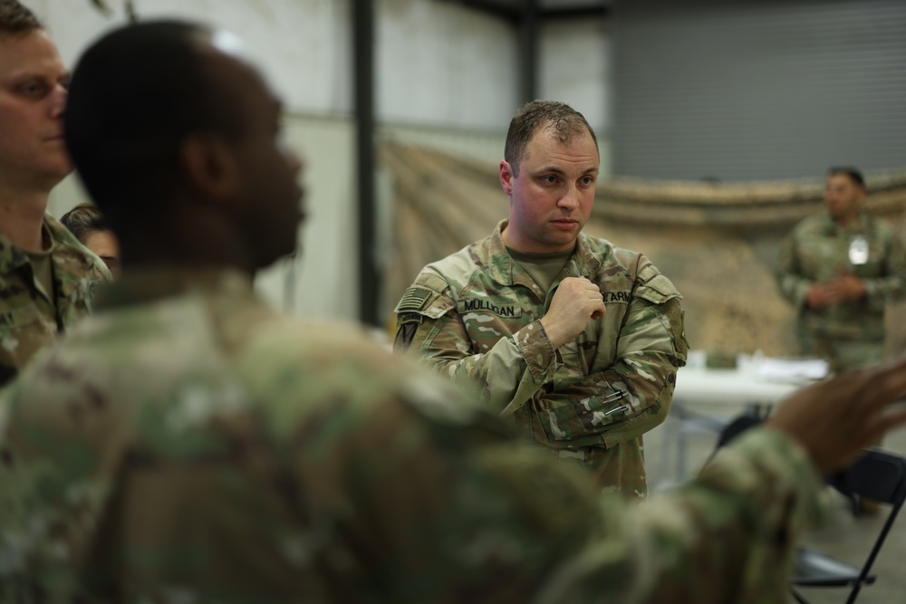 U.S. Army Maj. Michael Mulligan, III Armored Corps future operations planner conducts planning during Warfighter Exercise 25-4