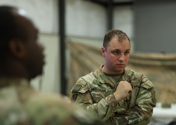 U.S. Army Maj. Michael Mulligan, III Armored Corps future operations planner conducts planning during Warfighter Exercise 25-4