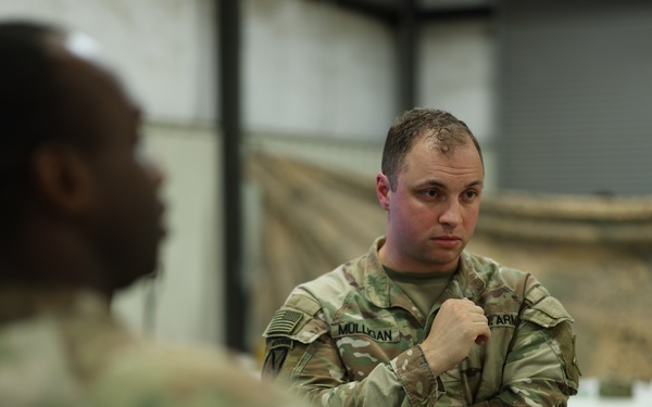 U.S. Army Maj. Michael Mulligan, III Armored Corps future operations planner conducts planning during Warfighter Exercise 25-4