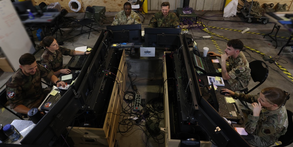 Allied planners use Virtual Joint Operations Center (VJOC) and the  Multi-Agent Virtual Environment (MAVEN) to track movements and communicate with units across the battlefield during Warfighter Exercise 25-4