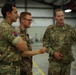 U.S. Army fire support officer talks with allied members during Warfighter 25-4