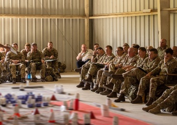 Members of 3rd United Kingdom Division conduct a rehearsal of concept drill during Warfighter Exercise 25-4