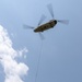 28th ECAB airlifts decommissioned Huey from mountaintop