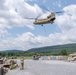 28th ECAB airlifts decommissioned Huey from mountaintop