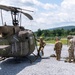 28th ECAB airlifts decommissioned Huey from mountaintop