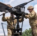 28th ECAB airlifts decommissioned Huey from mountaintop