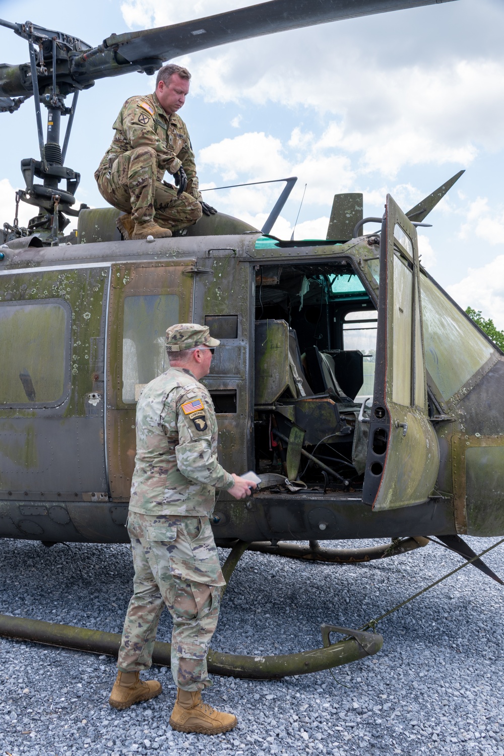 28th ECAB airlifts decommissioned Huey from mountaintop