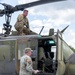 28th ECAB airlifts decommissioned Huey from mountaintop