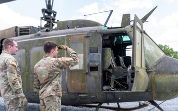28th ECAB airlifts decommissioned Huey from mountaintop