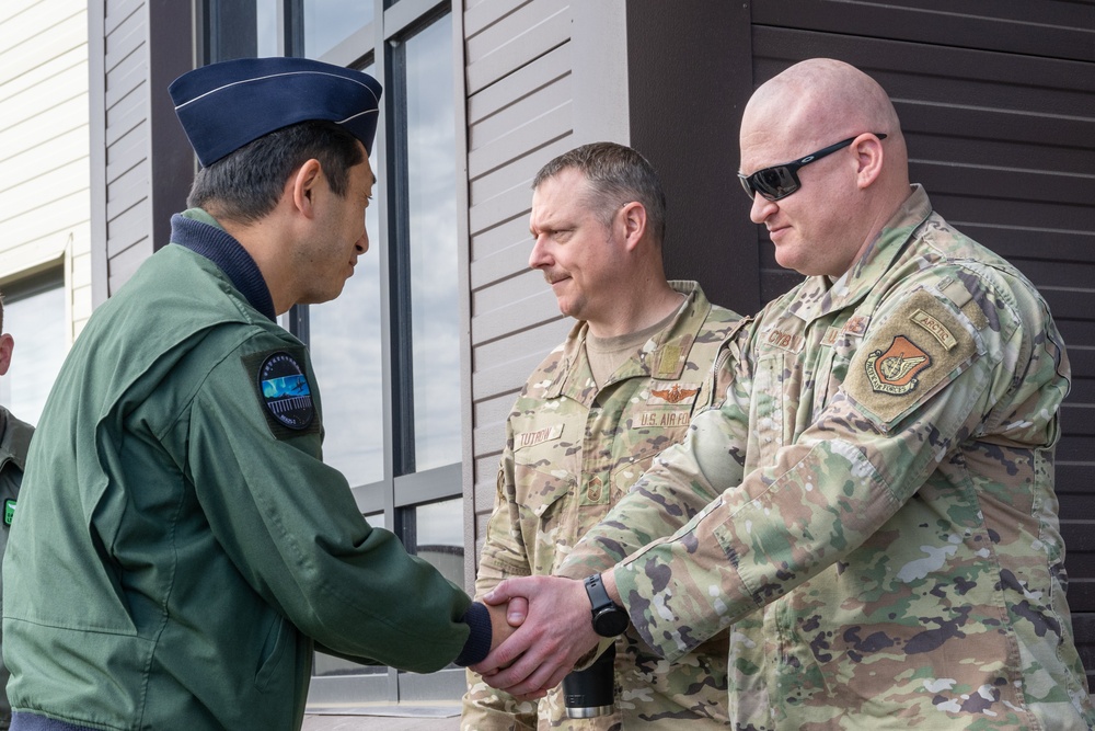 JASDF E-767 leader greets 962nd AACS leadership