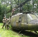 28th ECAB airlifts decommissioned Huey from mountaintop