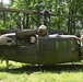 28th ECAB airlifts decommissioned Huey from mountaintop