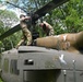 28th ECAB airlifts decommissioned Huey from mountaintop