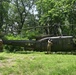 28th ECAB airlifts decommissioned Huey from mountaintop