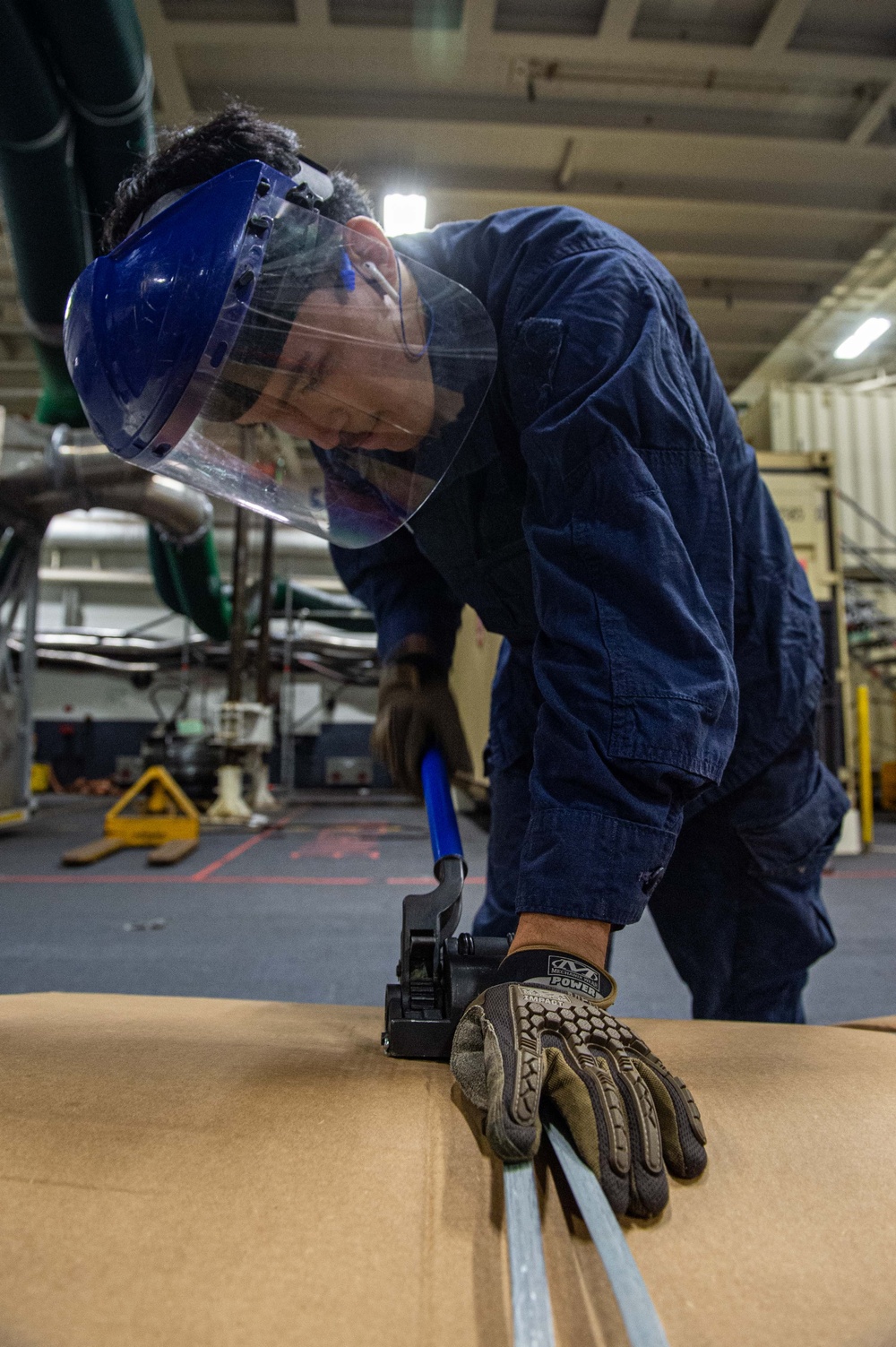 Ronald Reagan Sailors Remove Racks from Berthing