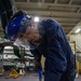 Ronald Reagan Sailors Remove Racks from Berthing
