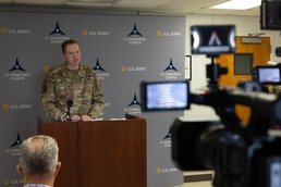 U.S. Army Maj. Brent Green, talks with mock press during Warfighter 25-4
