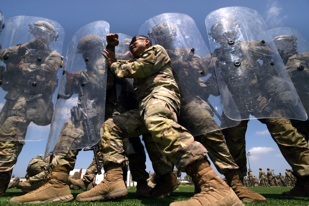 California Army Guard cavalry unit trains on crowd management and riot control techniques