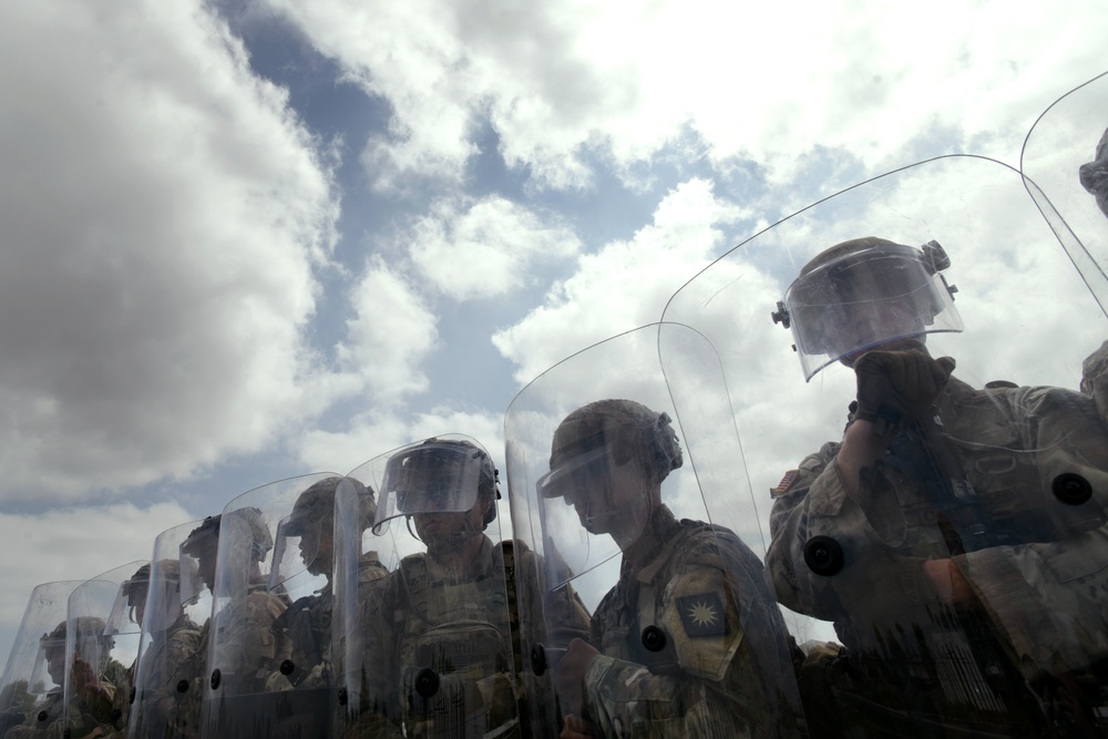California Army Guard cavalry unit trains on crowd management and riot control techniques