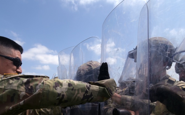 California Army Guard cavalry unit trains on crowd management and riot control techniques