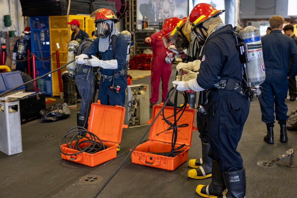 Sailor onboard USS Iwo Jima Participate in a Damage Control Drill