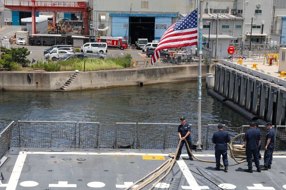 Sailors aboard the USS John Finn conduct a sea and anchor detail in Yokosuka, Japan