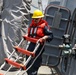 Sailors aboard the USS John Finn conduct a sea and anchor detail in Yokosuka, Japan