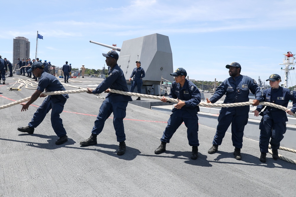 Sailors aboard the USS John Finn conduct a sea and anchor detail in Yokosuka, Japan