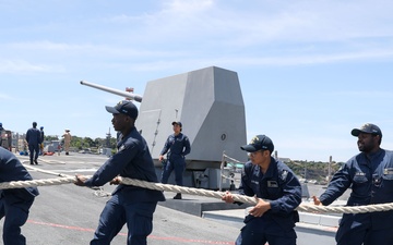 Sailors aboard the USS John Finn conduct a sea and anchor detail in Yokosuka, Japan