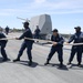Sailors aboard the USS John Finn conduct a sea and anchor detail in Yokosuka, Japan