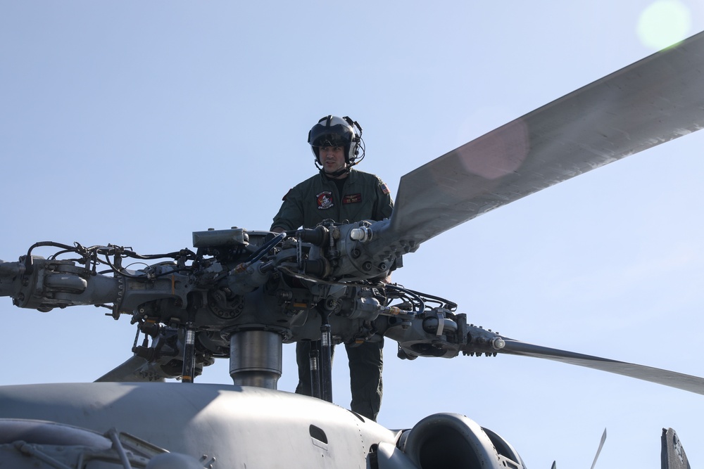Sailors aboard the USS John Finn conduct flight quarters in Sagami Wan