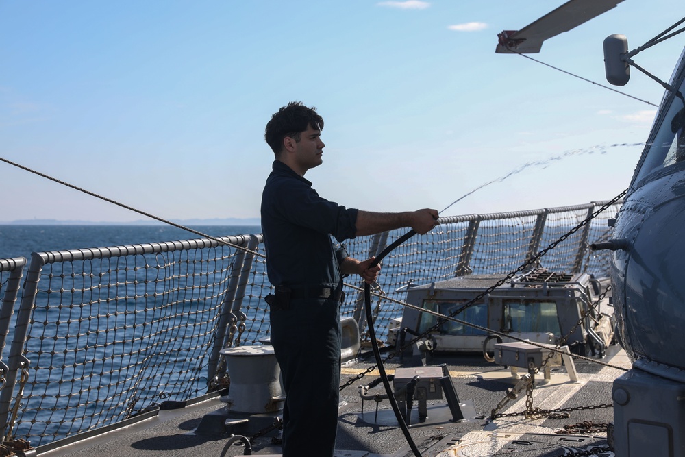 Sailors aboard the USS John Finn conduct flight quarters in Sagami Wan