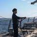Sailors aboard the USS John Finn conduct flight quarters in Sagami Wan