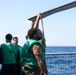 Sailors aboard the USS John Finn conduct flight quarters in Sagami Wan