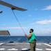 Sailors aboard the USS John Finn conduct flight quarters in Sagami Wan