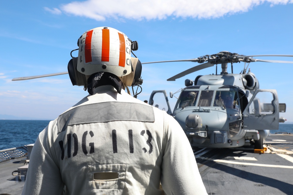 Sailors aboard the USS John Finn conduct flight quarters in Sagami Wan