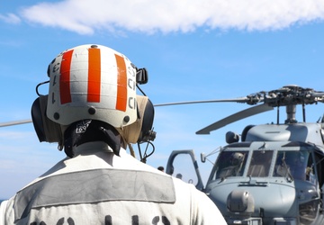 Sailors aboard the USS John Finn conduct flight quarters in Sagami Wan