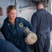 Sailors Reload Chaff Launchers Aboard USS Tripoli