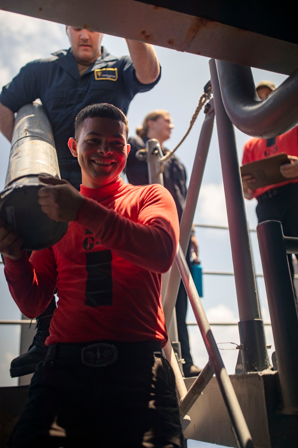Sailors Reload Chaff Launchers Aboard USS Tripoli