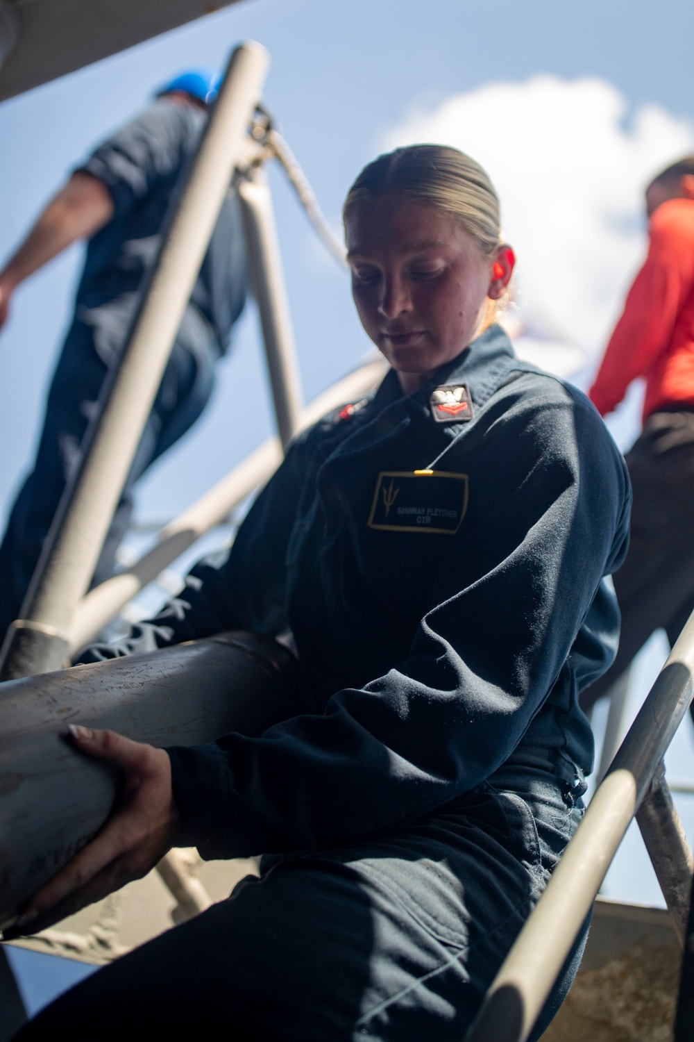 Sailors Reload Chaff Launchers Aboard USS Tripoli