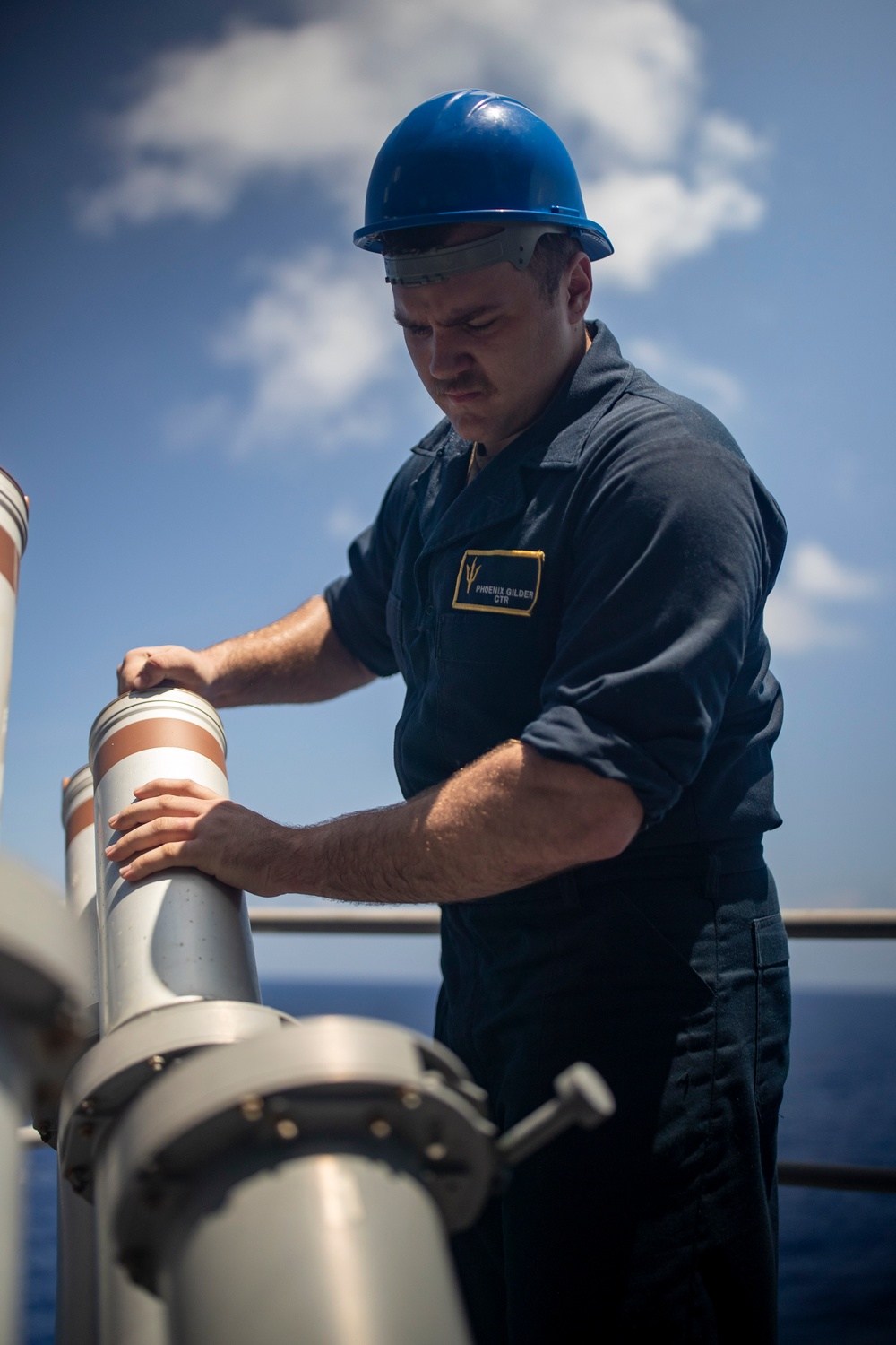 Sailors Reload Chaff Launchers Aboard USS Tripoli