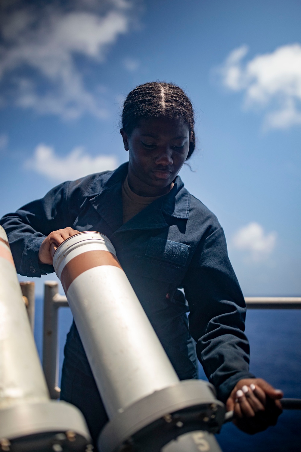 Sailors Reload Chaff Launchers Aboard USS Tripoli