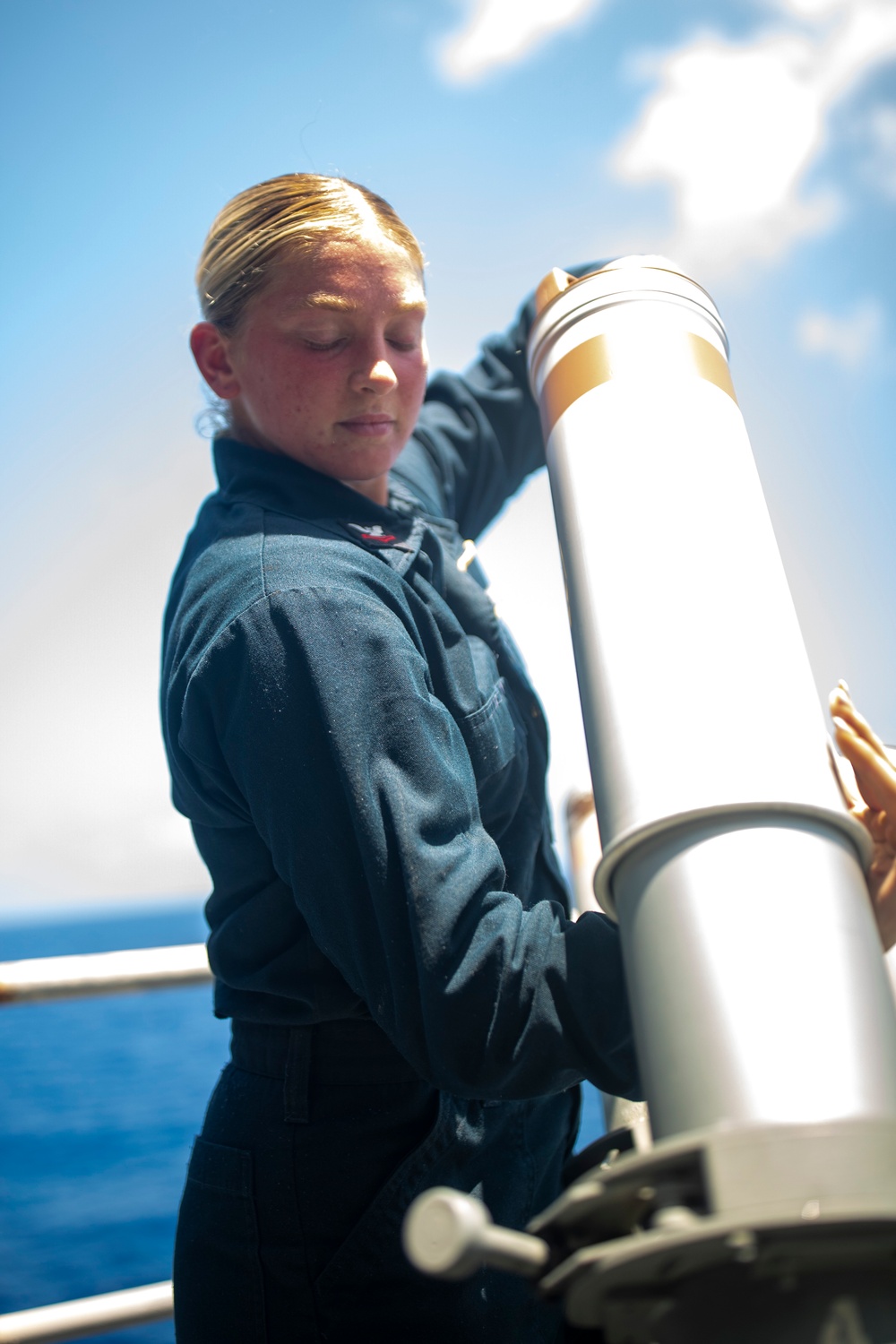Sailors Reload Chaff Launchers Aboard USS Tripoli