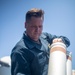 Sailors Reload Chaff Launchers Aboard USS Tripoli