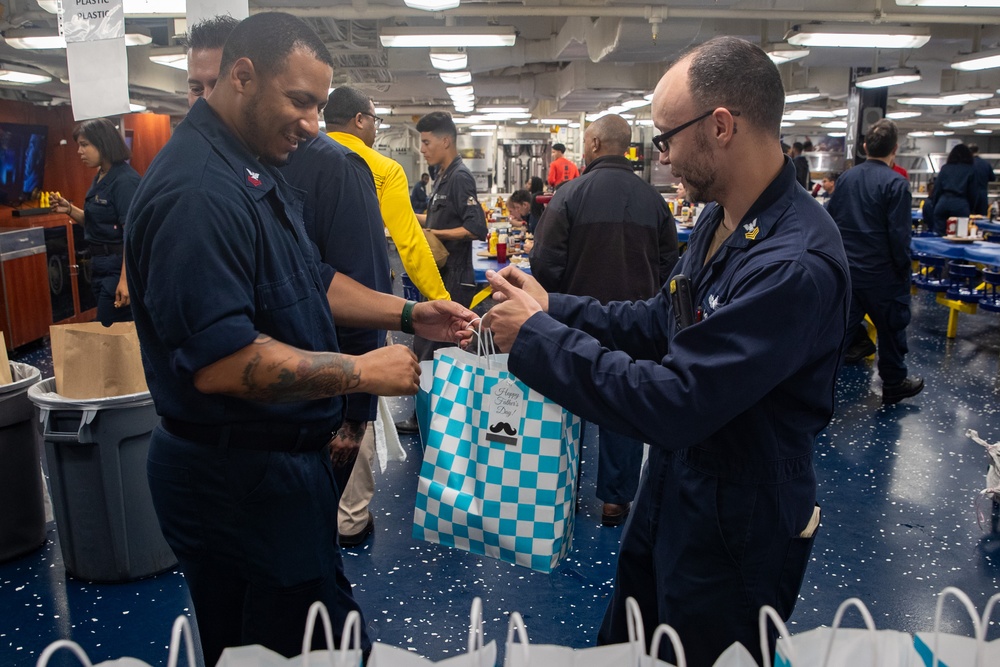 USS Tripoli’s Junior Enlisted Association Honors Tripoli Fathers With Customized Gift Bags