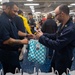 USS Tripoli’s Junior Enlisted Association Honors Tripoli Fathers With Customized Gift Bags