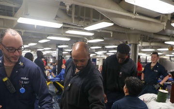 USS Tripoli’s Junior Enlisted Association Honors Tripoli Fathers With Customized Gift Bags