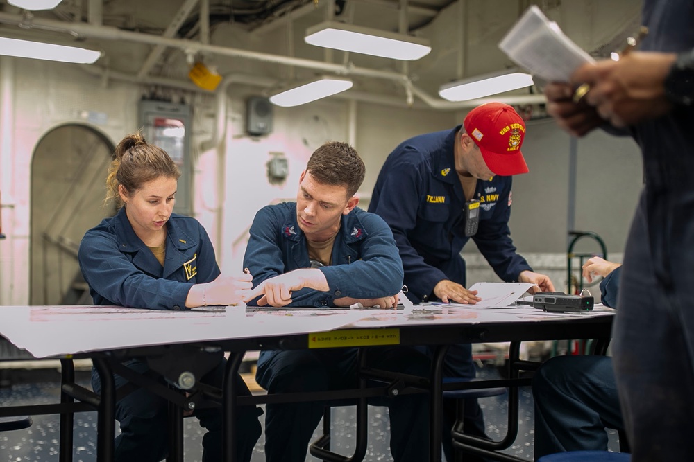 USS Tripoli Conducts Main Space Fire Drill