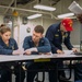 USS Tripoli Conducts Main Space Fire Drill