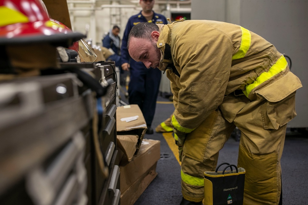 USS Tripoli Conducts Main Space Fire Drill